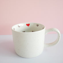 Load image into Gallery viewer, fair trade ceramic cup with hand painted hearts inside
