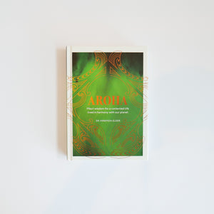 Emerald green hard cover, with gold Māori motif deisgns, gold lettered Aroha, Māori wisdom for a contented life lived in harmony with our planet, Dr Hinemoa Elder